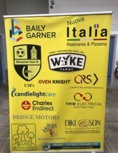 Banner listing sponsors of Wincanton Town FC